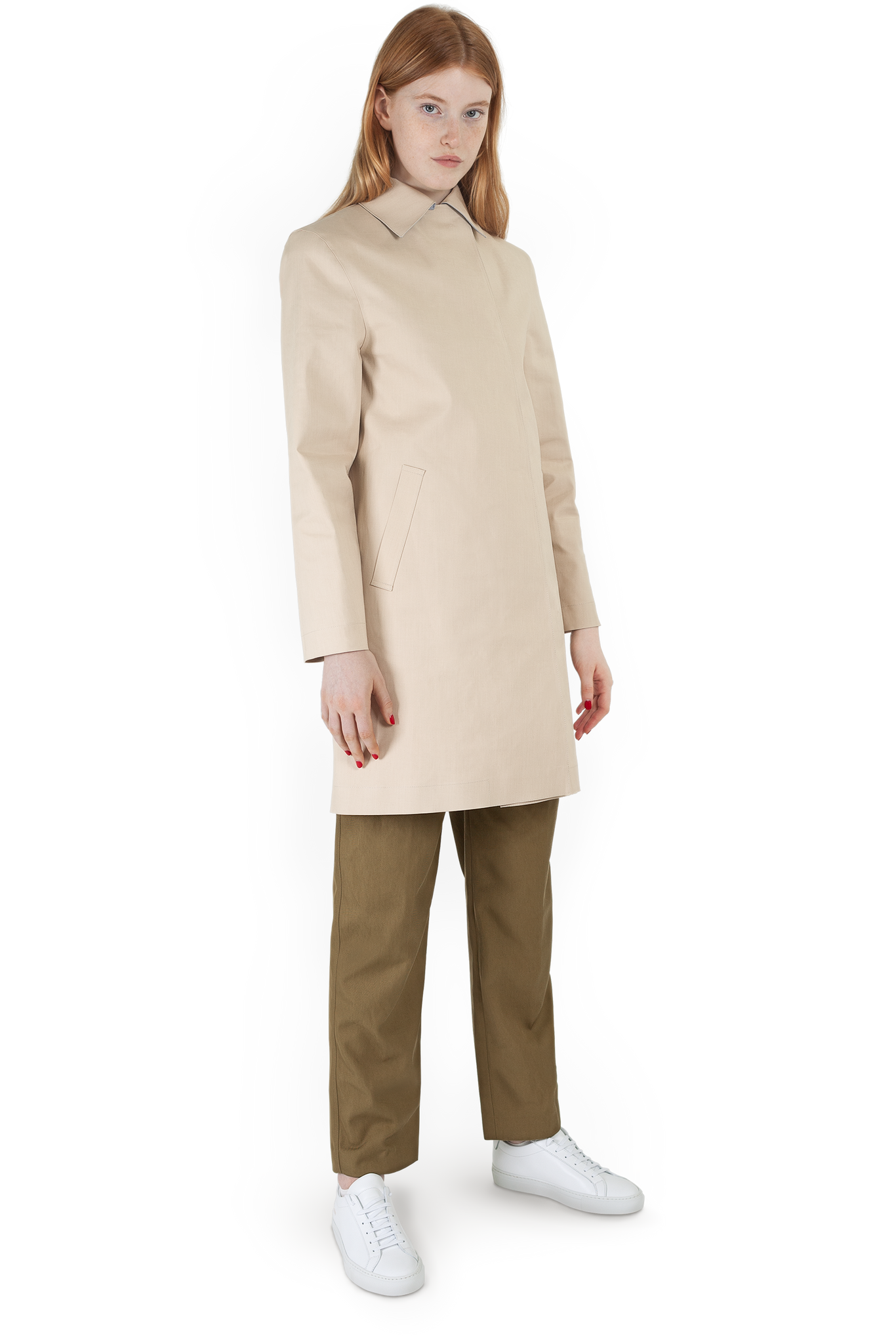 Female ginger model wearing sandstone coloured contemporary Faeroes mackintosh full body front angle shot
