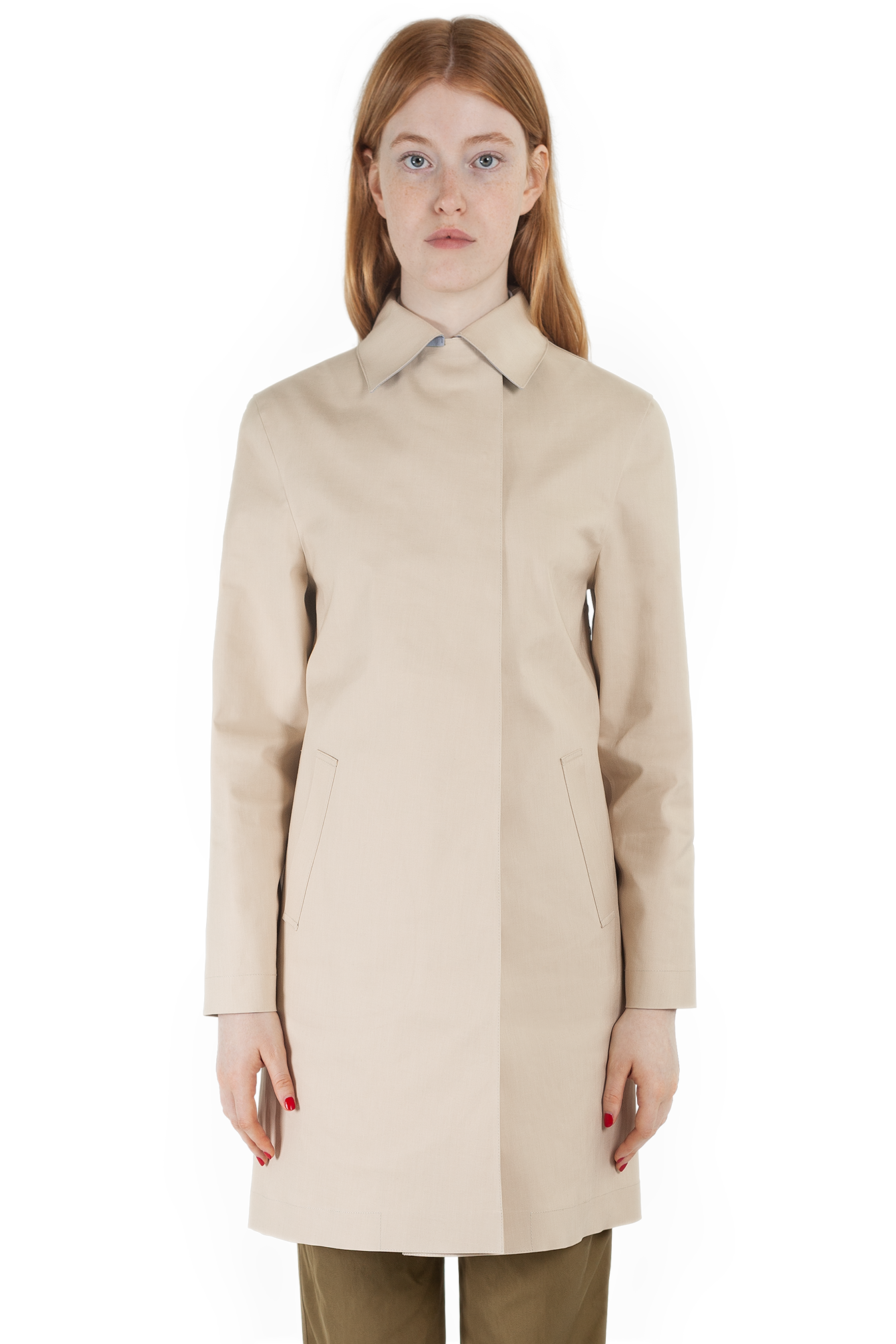 Female ginger model wearing sandstone coloured contemporary Faeroes mackintosh cropped front body shot